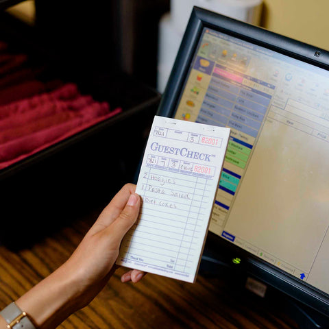 National Checking Company Guest Check Paper - 1 Part Green, 17 Line, 3.5 x 6.75 inch -- 5000 per case.